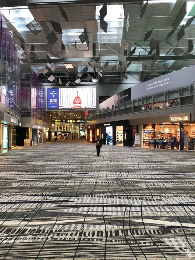 Empty transit hall at Changi Airport terminal 3, 23 March 2020