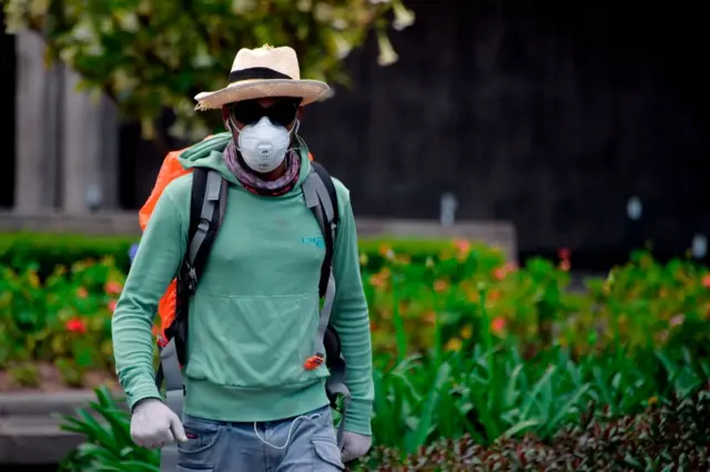 A man wearing a mask in Quito, Ecuador