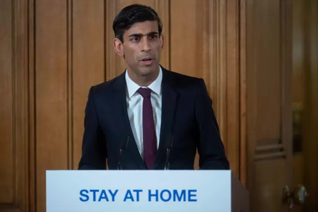 UK chancellor Rishi Sunak at news conference.