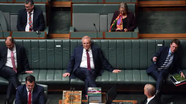 Australian parliament practising social distancing, with Prime Minister Scott Morrison centre)