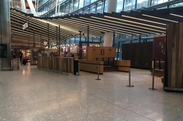 An empty Terminal 5 at Heathrow Airport, west London