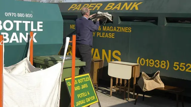 Man using recycling centre in Wales