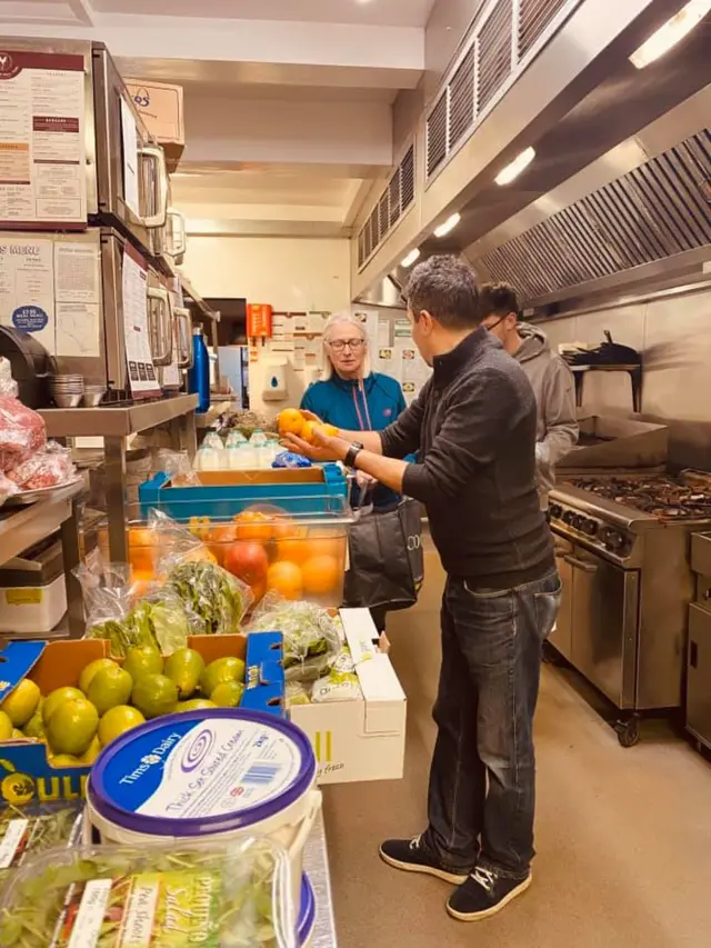 Staff with produce