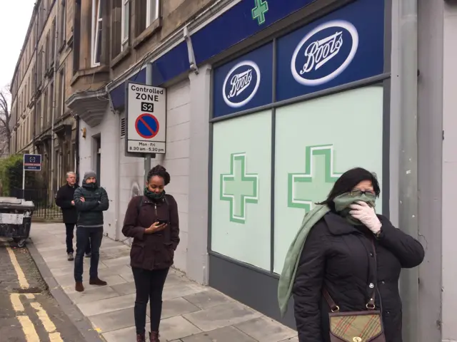 Boots in Morningside road in Edinburgh  Only one person allowed in the chemist at a time.