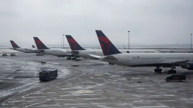 Delta planes parked in an airport