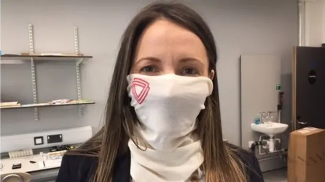 Woman wears a snood-mask