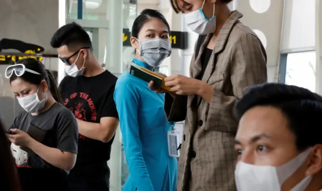 People wear masks in Danang City, Vietnam. File photo