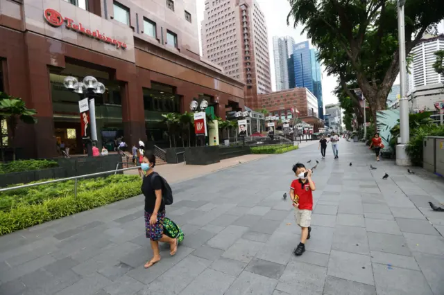 Shoppers on Singapore's Orchard Road on 24 March 2020