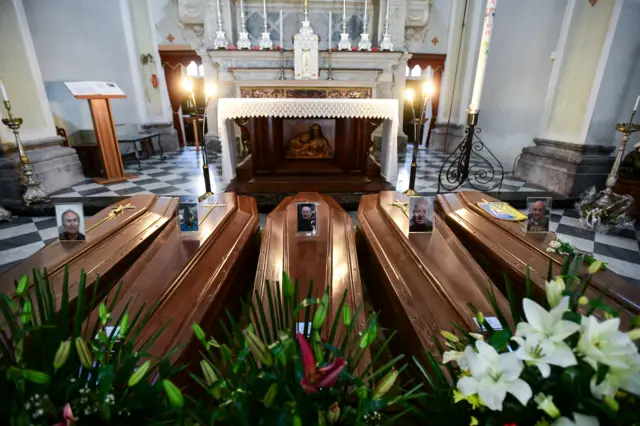 Coffins lined up in Italian church