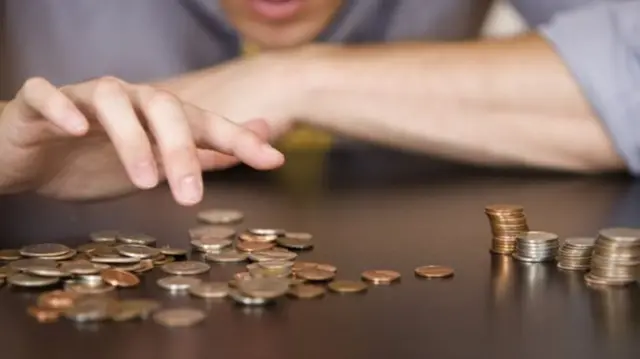 A person counting money