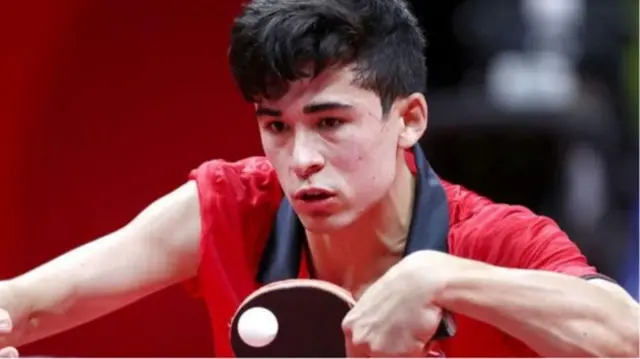 British Paralympic table tennis player Kim Daybell plays a shot