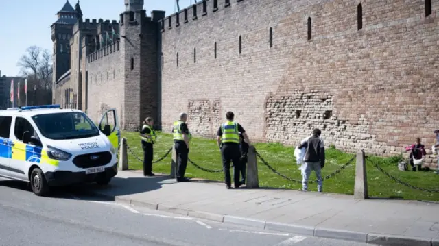 Police speak to people gathering in Cardiff