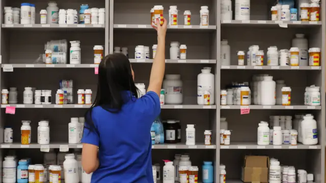 A person handling medicine