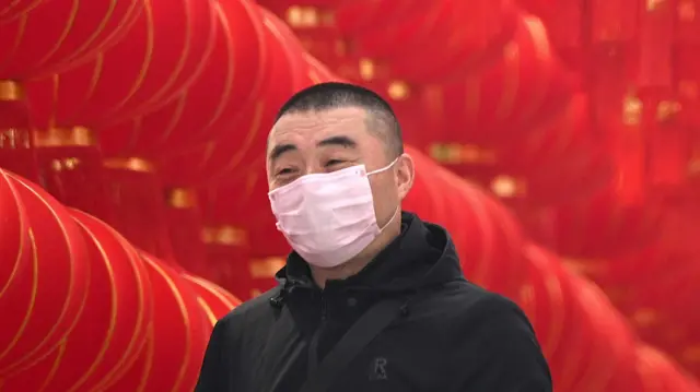 A man wearing a mask in China