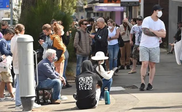 People queue outside a benefits centre