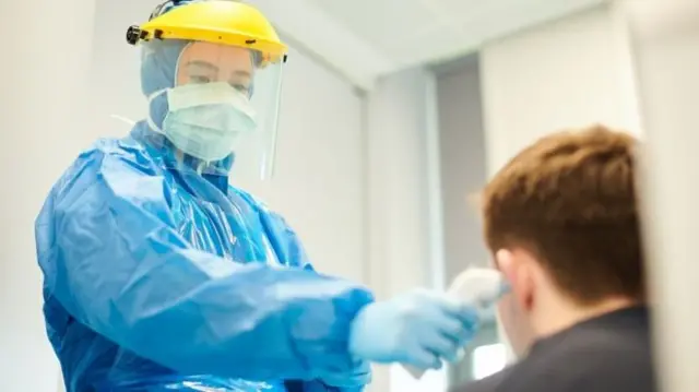 Person using PPE equipment