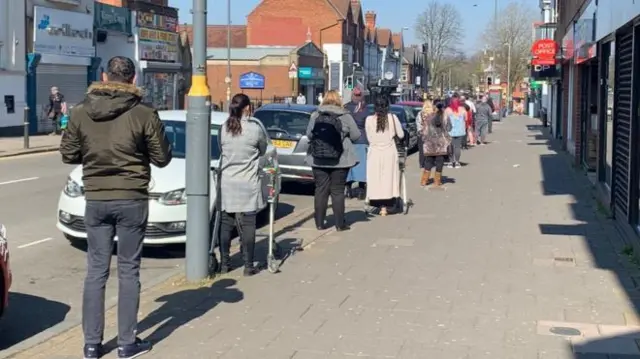 Thursday's scene outside Asda in the Kings Heath area of Birmingham