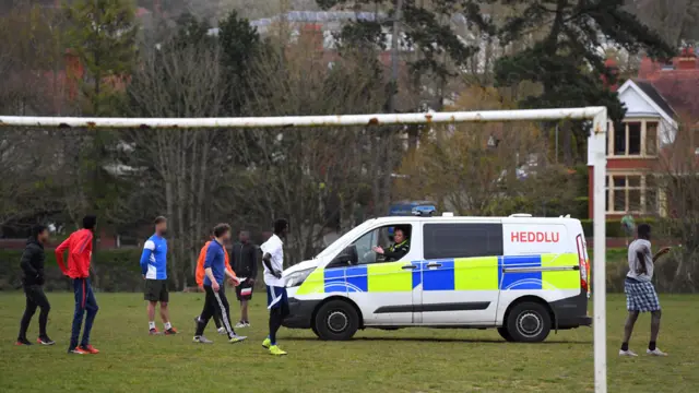 Footballers being spoken to by police