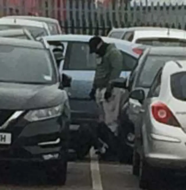 Somebody underneath a car