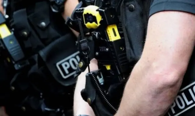 Police with Tasers