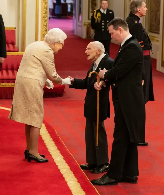 Harry Billinge from St Austell is made an MBE by Queen Elizabeth II during an investiture ceremony at Buckingham Palace in London