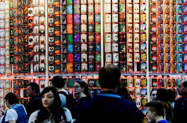 Visitors attend the Leipzig Book Fair, in Leipzig, Germany, 21 March 2019