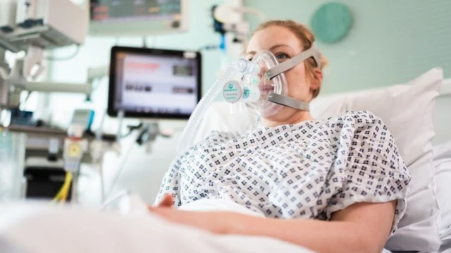 Woman on hospital bed