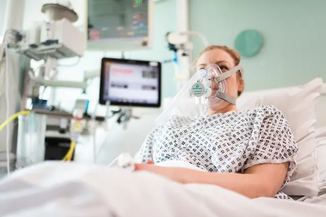 Photo of a patient using a newly developed continuous positive airway pressure (CPAP) breathing aid