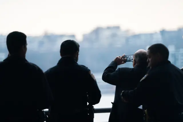 Rudy Giuliani watches USNS Comfort docking