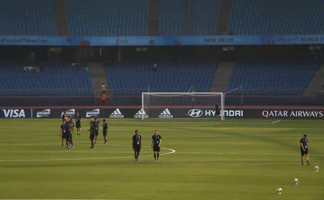 Footballers practicing at the JLN Stadium in Delhi in 2017