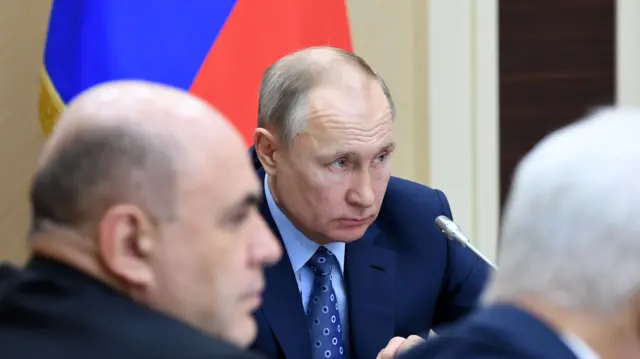 Russian President Vladimir Putin chairs a meeting with members of the government in Moscow 4 March 2020