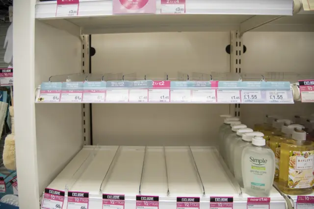 Empty shelves of anti-bacterial hand sanitiser