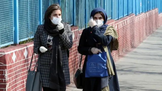 Iranian women in Tehran wearing medical masks