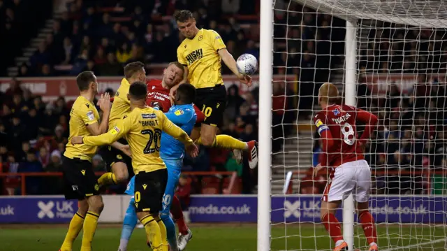 Matt Smith heads in Millwall's third