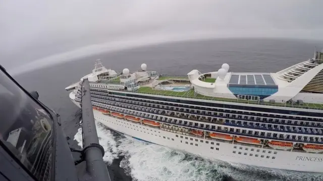 Helicopter flying towards the Grand Princess