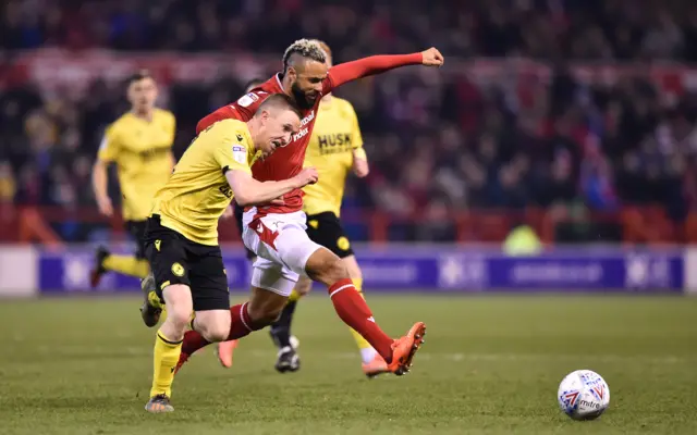 Forest's John Bostock in action