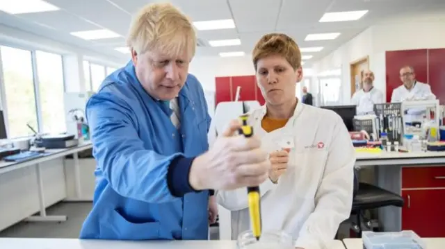 Boris Johnson at a lab