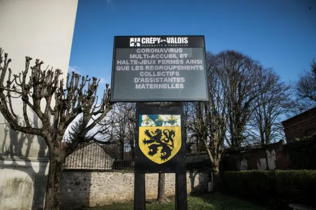 A sign says children's facilities are closed due to the coronavirus in Crepy-en-Valois, Oise department, France. Photo: 6 March 2020