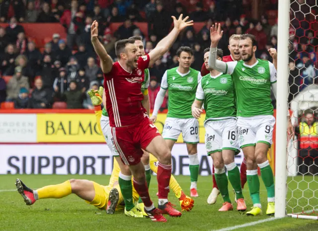 Andrew Considine celebrates