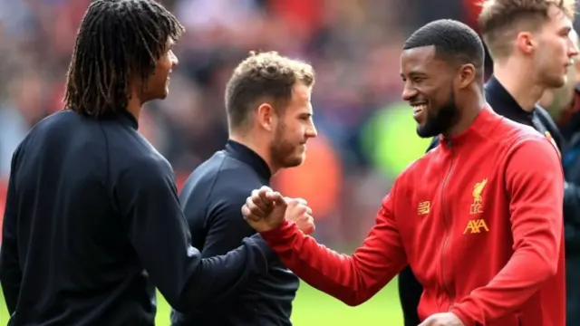 Bournemouth"s Nathan Ake (left) and Liverpool"s Georginio Wijnaldum (right) greet