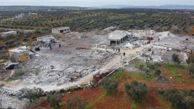 An aerial view shows the rubble of buildings following air strikes in Syria's north-western Idlib province