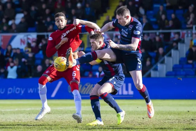 Rangers' Connor Goldson under pressure from Callum Morris