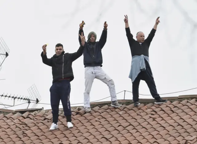 Prisoners at the roof of the San Vittore prison in Milan, northern Italy