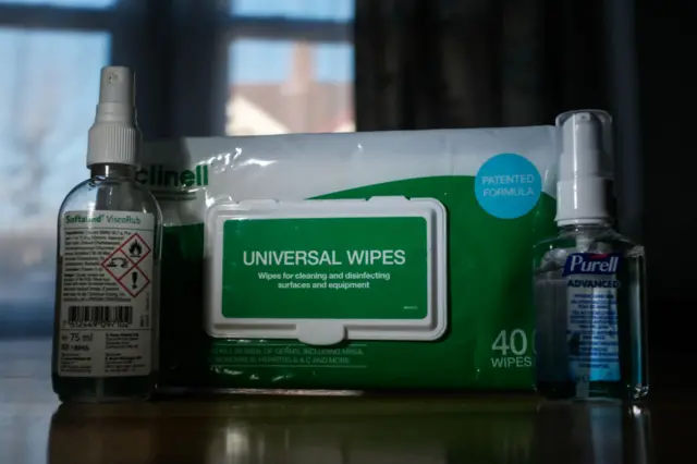 View of a composition of hand sanitizers and wipes, London on March 8, 2020.