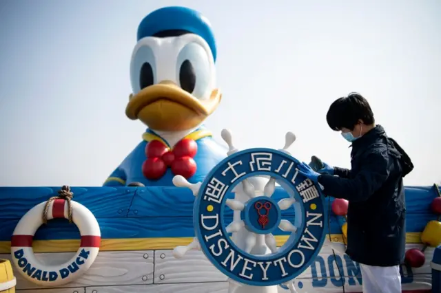 A worker at the Disney resort in Shanghai on 23 February, during the shutdown