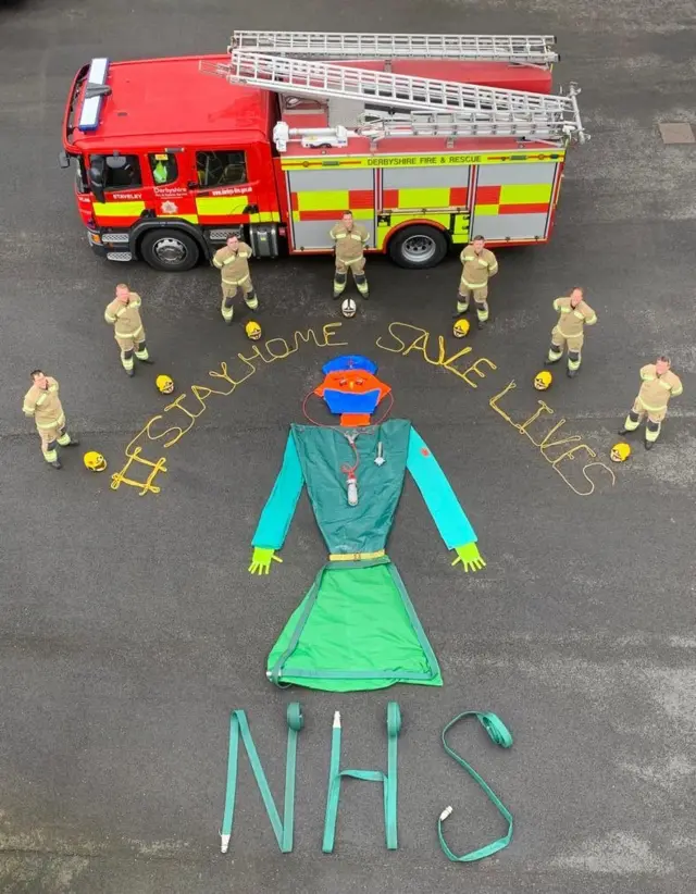 Aerial view of firefighters with artwork