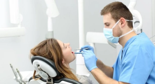 Woman receiving dental treatment