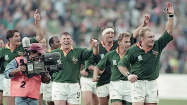 South Africa rugby players, led at front by Francois Pienaar