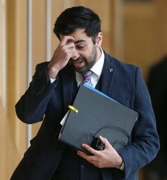 Justice Secretary Humza Yousaf on the way to the chamber