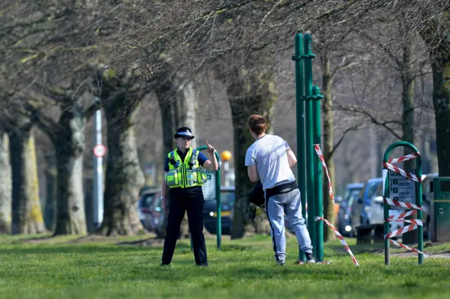 A PCSO stops a man using park equipment